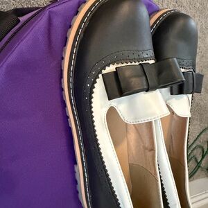 Women’s Two-Tone Black and White Bow Loafers